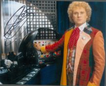 Dr Who actor Colin Baker signed 10 x 8 inch colour scene photo. Good condition. All autographs