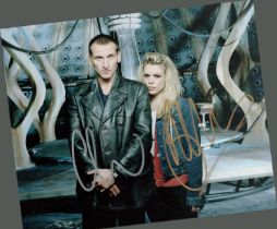 Christopher Eccleston and Billie Piper signed 10x8 inch Doctor Who colour photo. Good condition. All