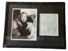 Joan Crawford mounted signed letter dated January 18th 1974 with black and white photo, framed.