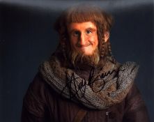 Adam Brown signed Hobbit 10x8 inch colour photo. Good condition. All autographs come with a