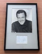 William Holden signed mounted and framed black and white photo with signature below. Good condition.