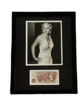 Mae West signed mounted and framed Bank of England note with black and white photo above. Measures