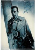 Humphrey Bogart signed black & white photo Approx. 11.75x11.75 Inch. Was an American actor. His