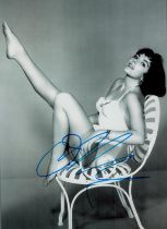 Joan Collins signed black & white photo 12x8 Inch. Is an English actress, author and columnist. With