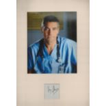 George Clooney signed 13"x18" colour mount. Good condition. All autographs come with a Certificate