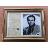 Laurence Olivier TLS with original mailing envelope mounted and framed with black and white photo.