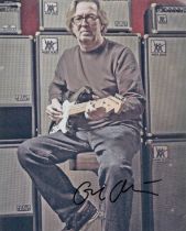 Eric Clapton signed colour photo 10x8 Inch. Is an English rock and blues guitarist, singer, and