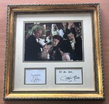 Simon Callow and Ciaran Hinds signed mounted and framed Phantom of The Opera. Measures 18"x18" appx.