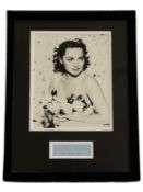 Olivia De Havilland signed and framed black and white photo. Measures 17x13 appx. Good condition.