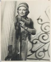 Anna Neagle signed 10x8inch black and white photo. Few knocks and marks to photo caused by age.