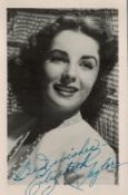 Elizabeth Taylor signed vintage black & white photo 5.5x3.5 Inch. Was a British and American