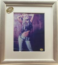 Signed Framed colour Photo of Christina Aguilera Autograph is written in pen on the bottom right