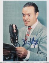 Bob Hope signed colour photo 10x8 Inch of the legendary British comedian, pictured reading a