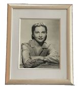 Joan Fontaine signed mounted and framed black and white photo. Good condition. All autographs come
