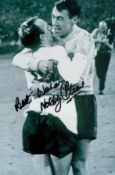 Football 1966 World Cup hero Nobby Stiles signed 12 x 8 inch b/w Cup celebration photo, hugging