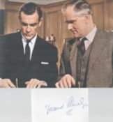 James Bond Q actor Demond Llewelyn signed white card inscribed Q along with a grainy 10 x 8 colour