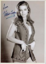 Carry On, James Bond actor Valerie Leon signed sexy 7 x 5 inch 3/4 length b/w photo. English actress