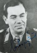 WW2 Luftwaffe fighter ace Gustav Frielinghaus KC signed 4 x 3 inch b/w rare portrait photo. Gustav
