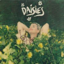 Music Katie Perry signed 45 RPM record sleeve for the hit Daisies. Good condition. All autographs