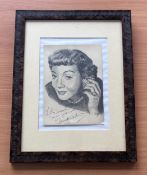 Claudette Colbert signed and framed art drawing dated 4/5/62. Measures 14"x18" appx. Good condition.