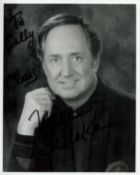 Neil Sedaka signed 10x8 inch black and white photo. Dedicated. Good condition. All autographs come
