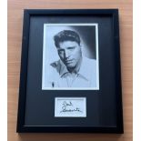 Burt Lancaster signed black and white photo in frame and signature below. Measures 13"x17" appx.