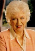 June Whitfield signed 6x4inch colour photo. Dedicated. Good condition. All autographs come with a