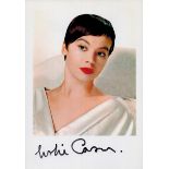 Leslie Caron signed 8.5x6 inch colour promo photo. Good condition. All autographs come with a