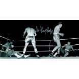 Sir Henry Cooper signed 16x8 black and white photo picturing the iconic moment when Henrys hammer