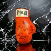 Michael Moorer signed red Everlast boxing glove inscribed Double M 1st southpaw heavyweight