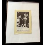 Muhammad Ali signed 20x16 inch framed and mounted black and white magazine photo. Good condition.