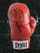 George Foreman signed red Everlast boxing glove. George Edward Foreman (born January 10, 1949) is an