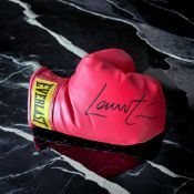 Lennox Lewis signed red Everlast boxing glove. Lennox Claudius Lewis CM CBE (born 2 September