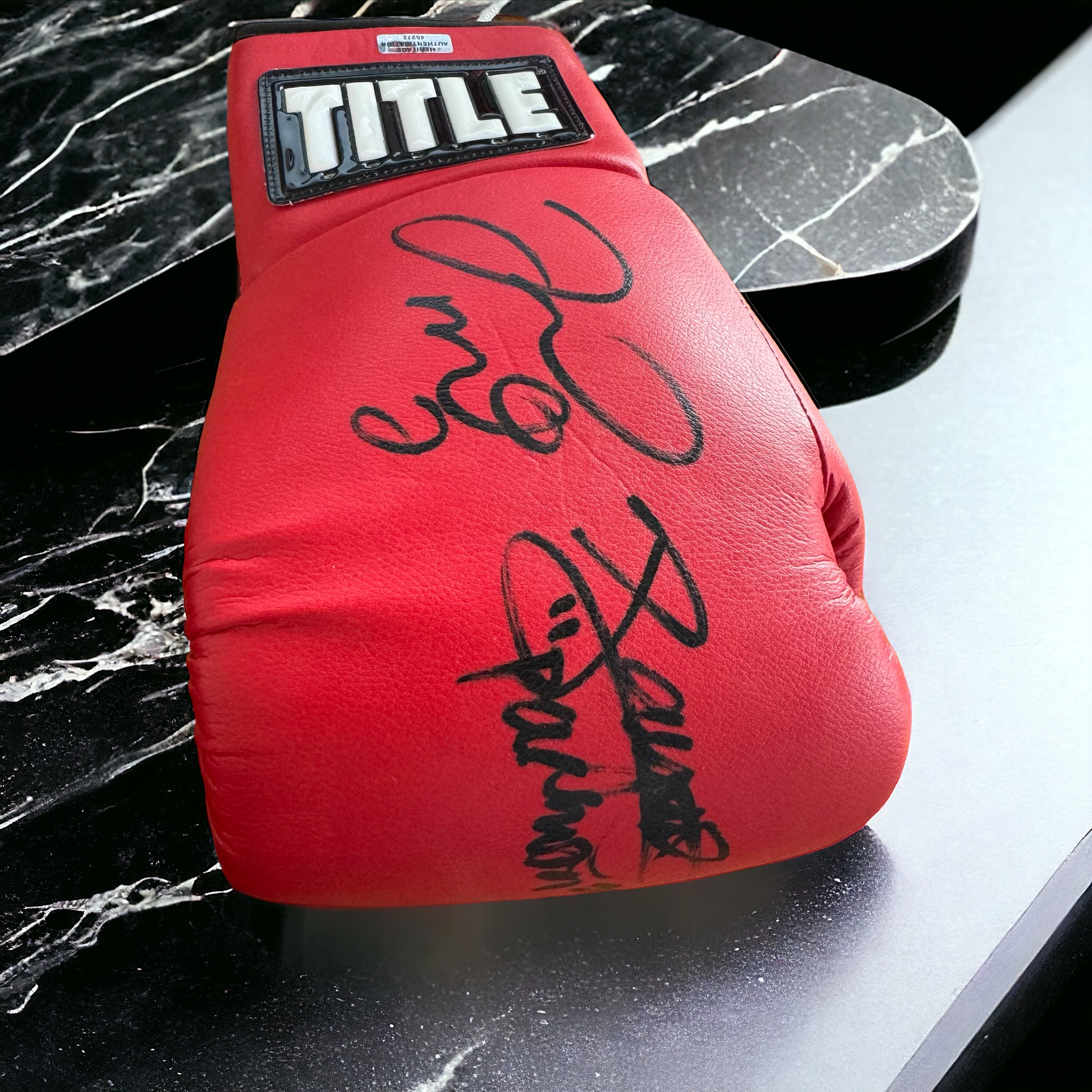 Floyd Mayweather Jr and Manny Pacquiao signed red Title boxing glove. Emmanuel Dapidran Pacquiao CLH