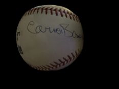 Carmen Basilio signed baseball in display case. April 2, 1927 - November 7, 2012) was an American
