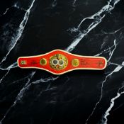 Manny Pacquiao, Fred Roach and one other signed IBF World Champion replica mini belt. Good