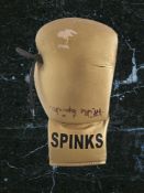 Michael Spinks signed golden boxing glove. Michael Spinks (born July 13, 1956) is an American former