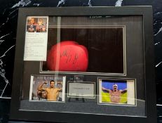Oleksander Usyk signed red Outshock 12oz boxing glove in 24x20x5 inch box display. Good condition.