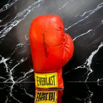 Carmen Basilio signed red Everlast boxing glove. Carmen Basilio (born Carmine Basilio, April 2, 1927