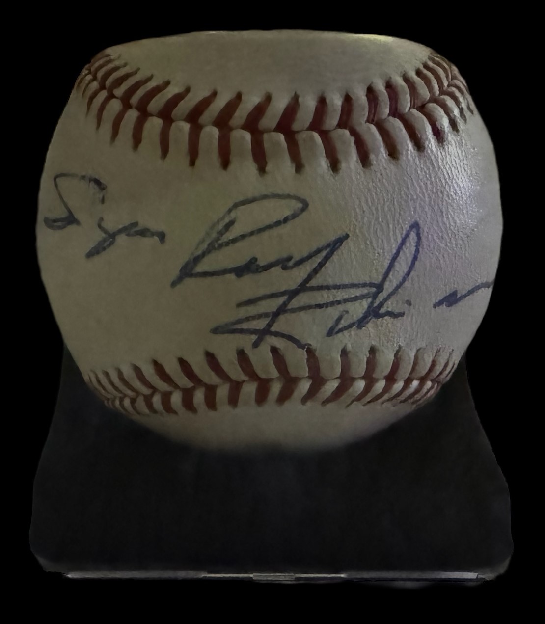 Sugar Ray Robinson signed baseball in display case. American professional boxer who competed from