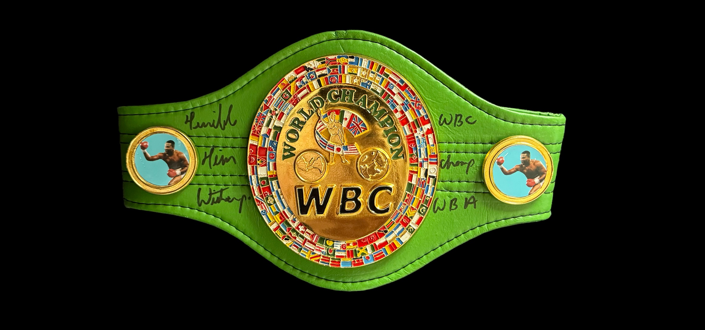 Tim Witherspoon signed WBC replica mini belt. Good condition. All autographs come with a Certificate