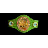 Tim Witherspoon signed WBC replica mini belt. Good condition. All autographs come with a Certificate