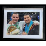 Vitali and Wladimir Klitschko signed colour photo. Mounted and framed to approx size 14x12inch. Good