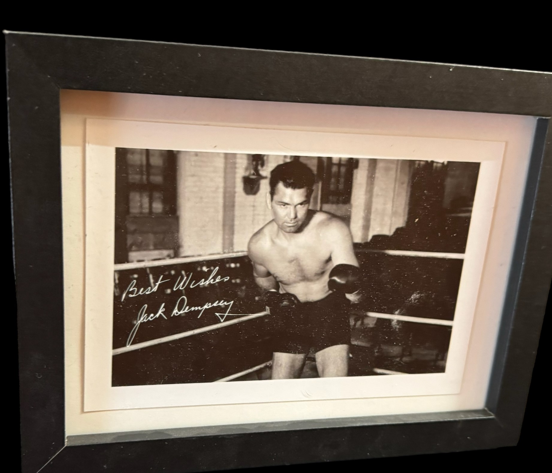 Jack Dempsey PRINTED signature black and white photo. Framed to approx size 7x5inch. Good condition.