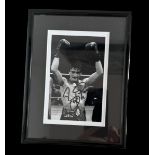 Barry Mcguigan signed black and white photo. Framed to approx 8x6inch. Good condition. All