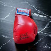 Roberto Duran signed red Lonsdale boxing glove. Roberto Durán Samaniego (born June 16, 1951) is a