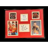 Micky Ward signed white card. Framed and mounted with 4 colour photos. Approx overall size