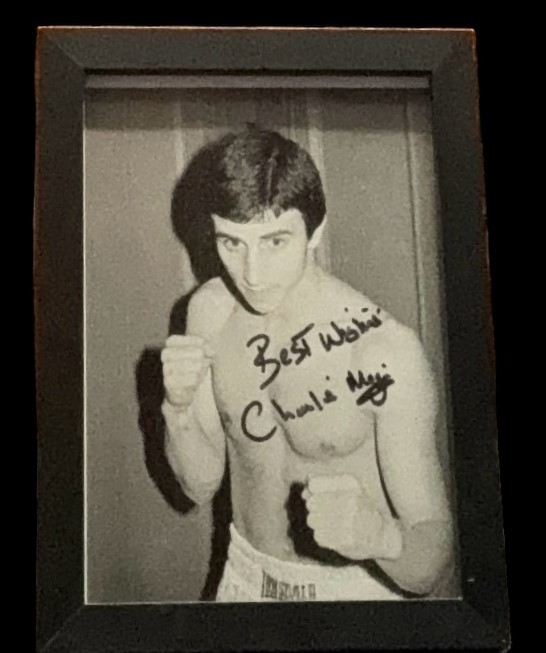 Charlie Magri signed black and white photo. Framed to approx size 8x6inch. Good condition. All