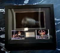 Anthony Joshua signed black boxing glove in 24x20x5 inch box display. Good condition. All autographs