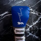 Earnie Shavers signed blue Lonsdale boxing glove. Good condition. All autographs come with a